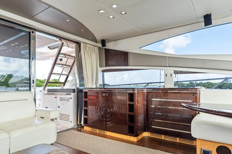 Slide: The Image of Luxurious interior of 2014 Sunseeker 68 Sport Yacht with elegant wood finishes and modern design. - 25