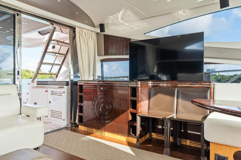 Slide: The Image of Interior cabin of 2014 Sunseeker 68 Sport Yacht with twin beds and colorful pillows. - 28