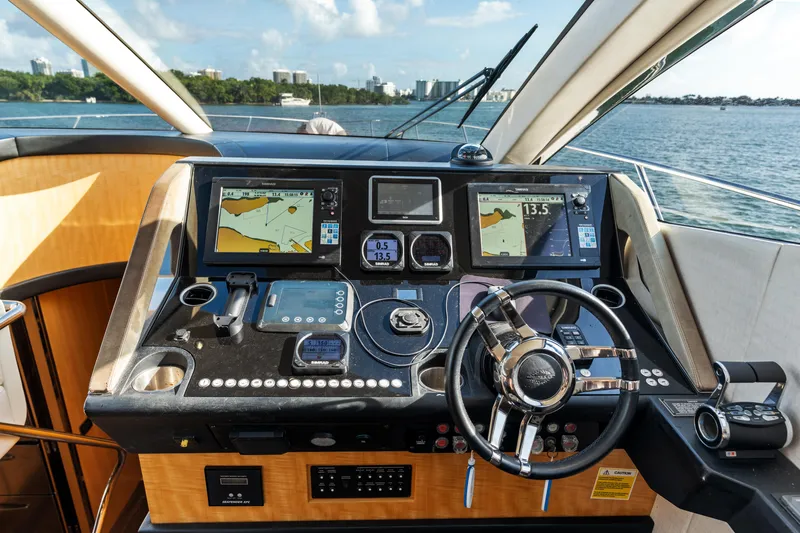 Slide: The Image of Luxurious Sunseeker 68 Sport Yacht 2014 with spacious deck and scenic waterfront view. - 32