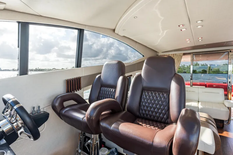 Slide: The Image of Luxurious Sunseeker 68 Sport Yacht 2014 with elegant deck seating and scenic ocean view. - 33