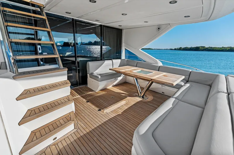Slide: The Image of Luxurious Sunseeker 68 Sport Yacht 2014 with spacious sunbathing area and wooden deck. - 36