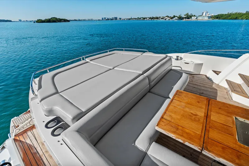 Slide: The Image of Open cabinet with a mini fridge on a 2014 Sunseeker 68 Sport Yacht. - 39