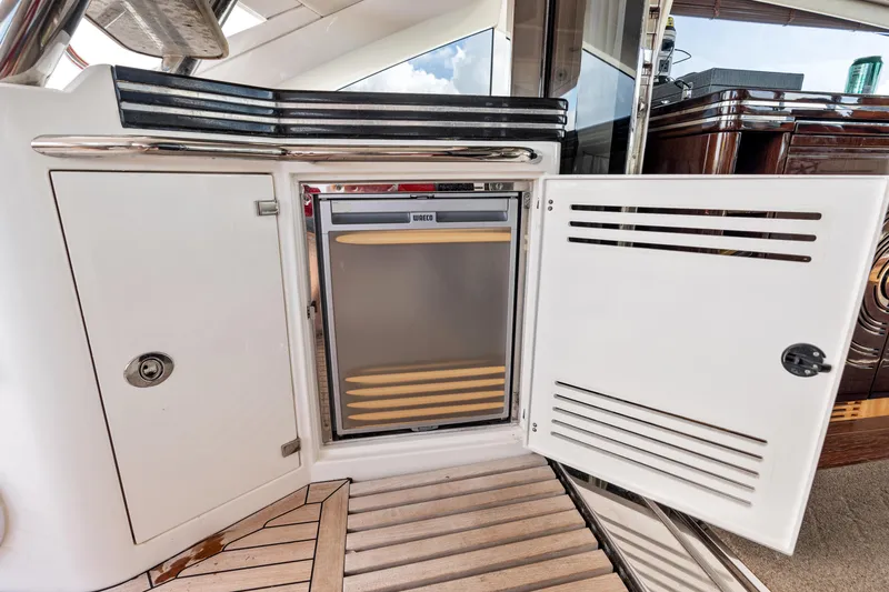 Slide: The Image of Luxurious Sunseeker 68 Sport Yacht 2014 with elegant deck seating and scenic ocean view. - 42