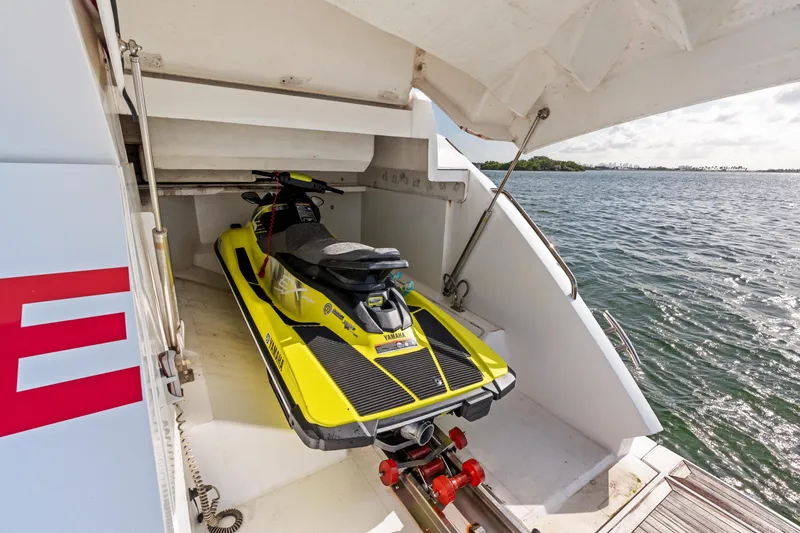 Slide: The Image of Engine room of 2014 Sunseeker 68 Sport Yacht, showcasing dual engines and control panels. - 56