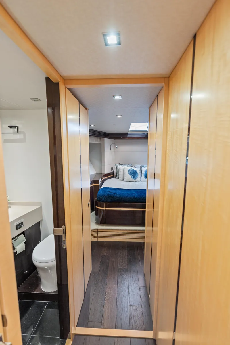 Slide: The Image of Engine room of 2014 Sunseeker 68 Sport Yacht with visible machinery and fire extinguishers. - 59