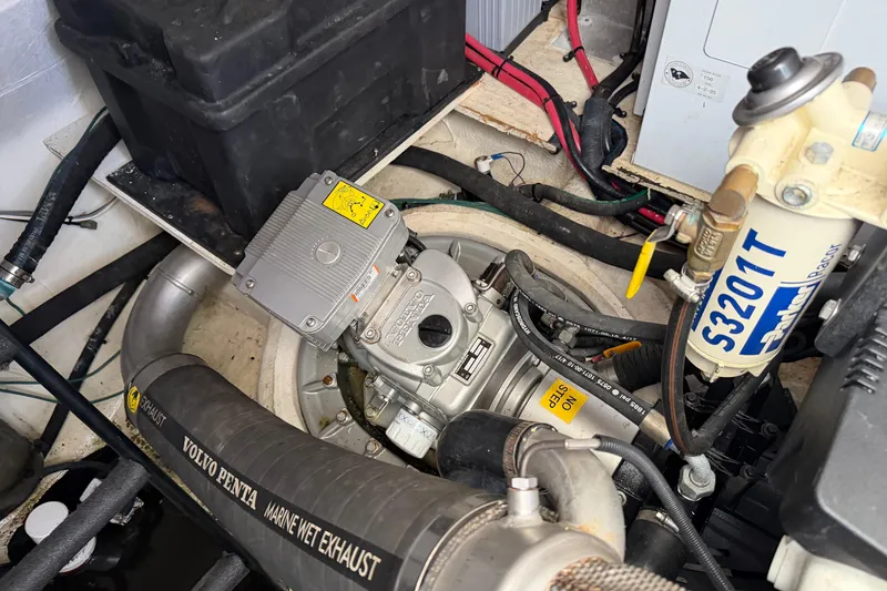 Slide: The Image of Engine compartment of 2019 Regal 42 Grande Coupe with Volvo Penta marine components. - 18