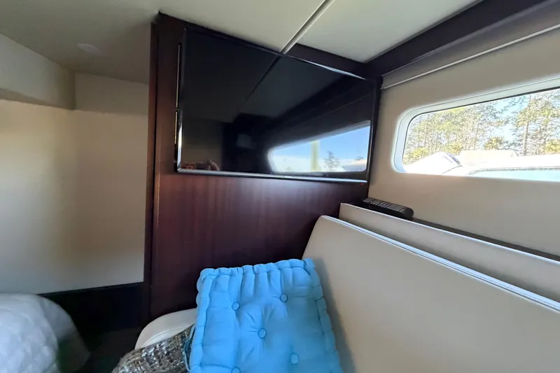 Slide: The Image of Interior of 2019 Regal 42 Grande Coupe with TV and window view. - 41