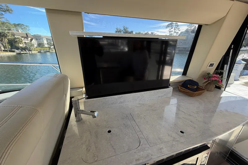 Slide: The Image of Interior of 2019 Regal 42 Grande Coupe with TV and marble countertop. - 58