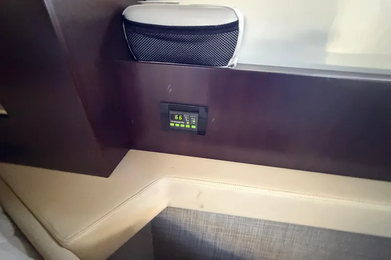 Slide: The Image of Interior of 2019 Regal 42 Grande Coupe with digital control panel. - 61