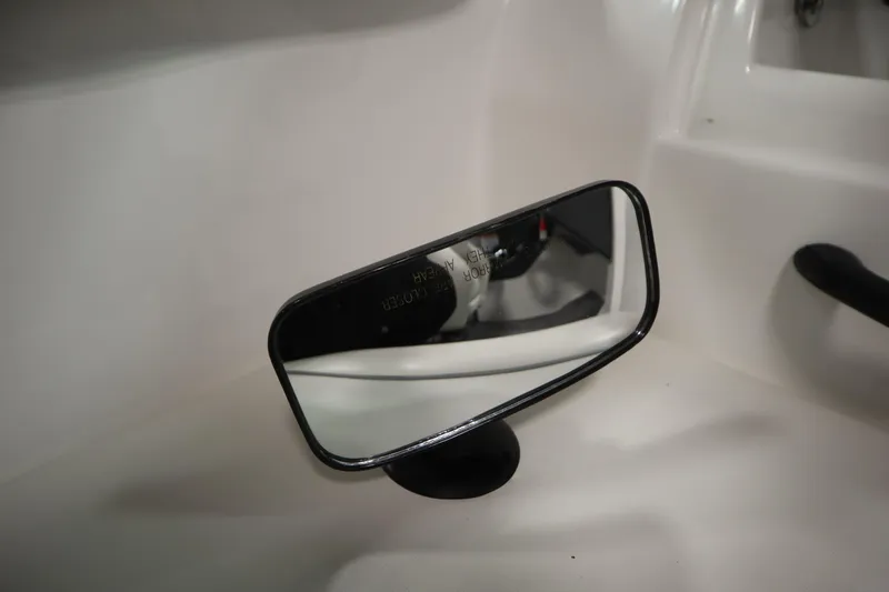 Slide: The Image of Side mirror of 2013 Yamaha Boats AR190, reflecting interior details. - 30