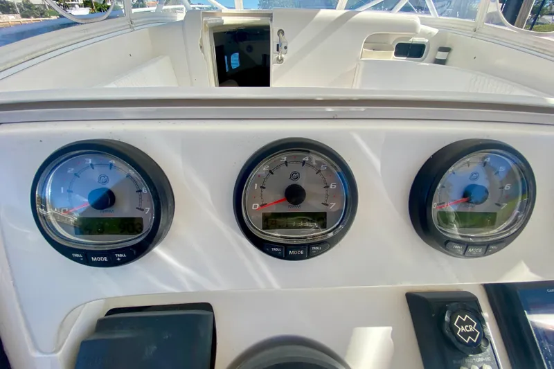 Slide: The Image of 2000 Intrepid 377 Walkaround boat interior with ocean view and clear blue sky. - 37