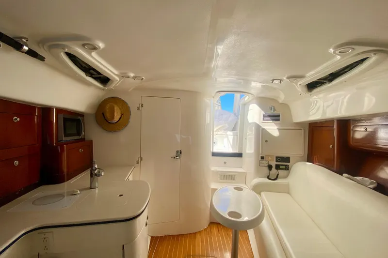 Slide: The Image of 2000 Intrepid 377 Walkaround boat bathroom with shower and toilet. - 55
