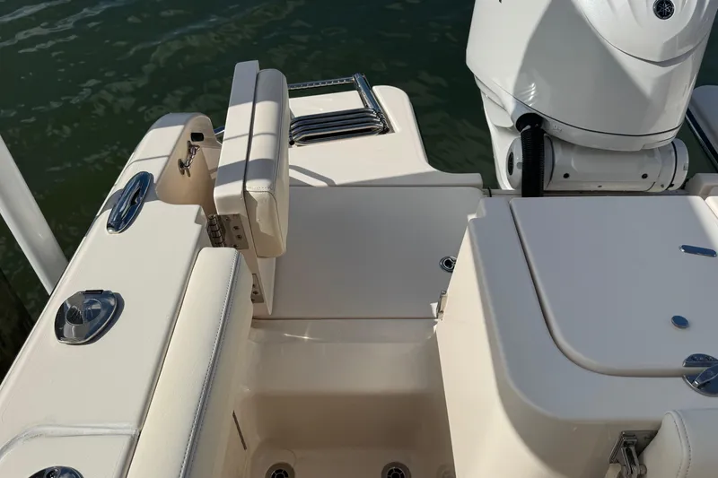 Slide: The Image of 2023 Grady-White Fisherman 236 boat deck with seating and motor detail. - 10