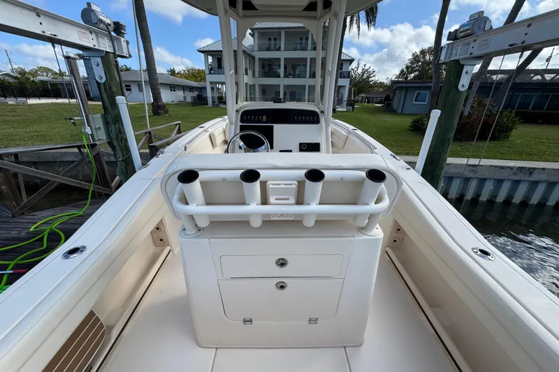 Slide: The Image of 2023 Grady-White Fisherman 236 boat interior with rod holders and console. - 17