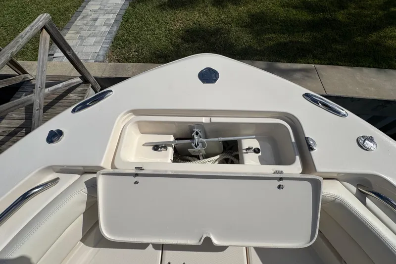 Slide: The Image of 2023 Grady-White Fisherman 236 boat anchor storage compartment, open view. - 34