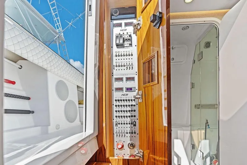 Slide: The Image of 2025 HCB 53 Suenos RXV yacht interior with control panel and modern design. - 39