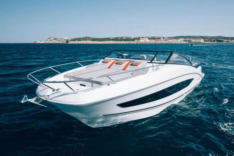 Slide: The Image of 2024 Beneteau Flyer 10 cruising on open water. - 4