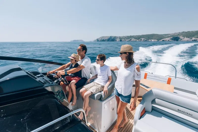 Slide: The Image of Family enjoying a ride on a 2024 Beneteau Flyer 10 boat. - 34