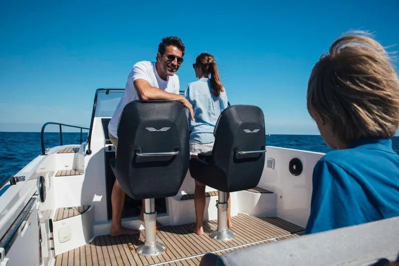 Slide: The Image of 2025 Beneteau Flyer 8 SUNdeck with passengers enjoying a sunny day at sea. - 19