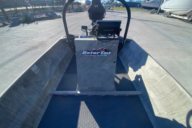 Slide: The Image of 2018 Gator Tail 17' boat interior with Garmin navigation system. - 11