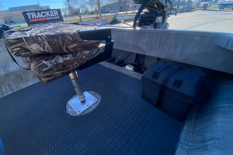 Slide: The Image of 2018 Gator Tail 17' boat interior with camo seat and battery box. - 15