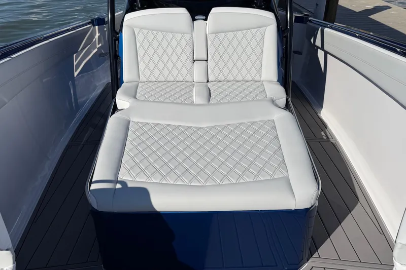 Slide: The Image of 2026 Nor-Tech 390 Sport Center Console with luxurious white diamond-stitched seating. - 38