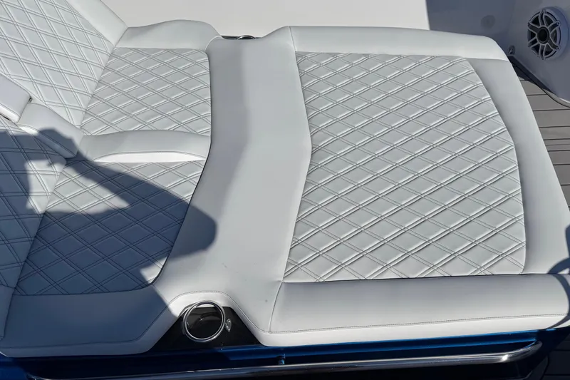 Slide: The Image of Luxurious seating on 2026 Nor-Tech 390 Sport Center Console with diamond-pattern upholstery. - 42
