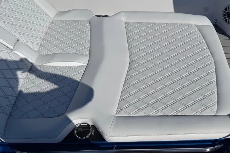 Slide: The Image of Luxurious seating on 2026 Nor-Tech 390 Sport Center Console with diamond stitching. - 43