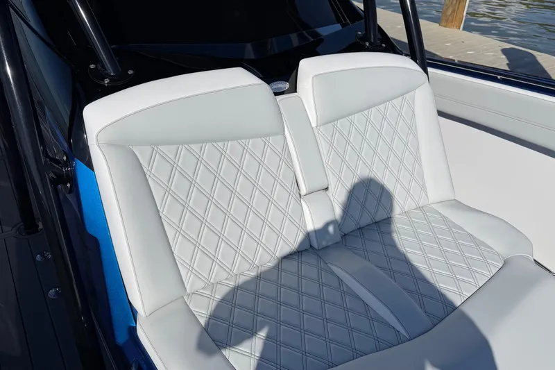 Slide: The Image of 2026 Nor-Tech 390 Sport Center Console with luxurious diamond-stitched seating. - 44