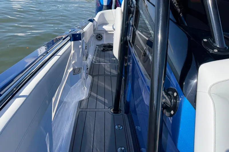 Slide: The Image of 2026 Nor-Tech 390 Sport Center Console boat with sleek deck design and modern features. - 50