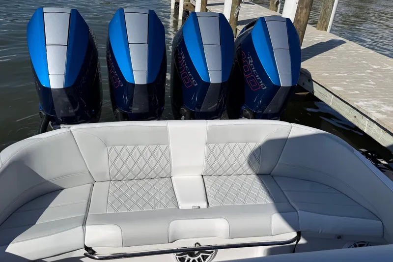Slide: The Image of 2026 Nor-Tech 390 Sport Center Console with quad engines and luxurious seating. - 55