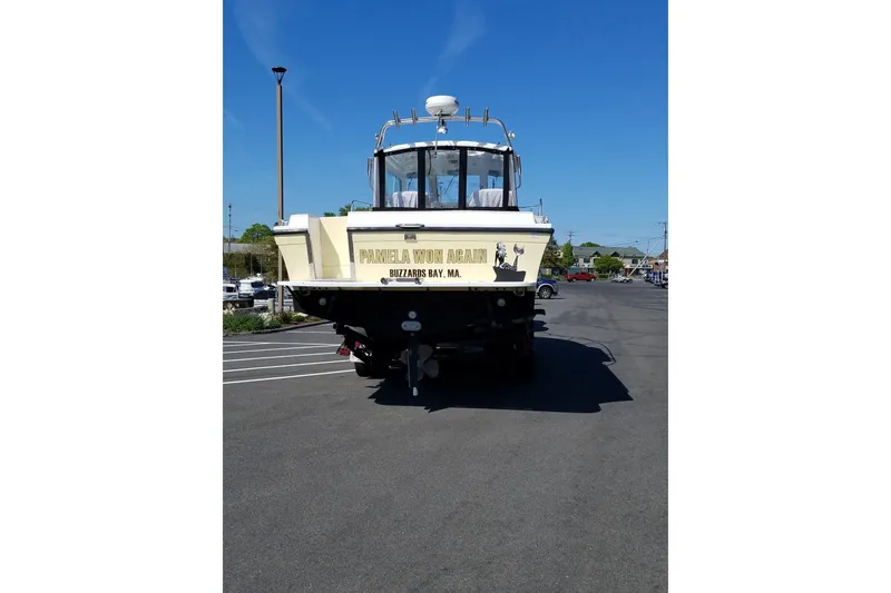 Slide: The Image of 2002 Albin 28 Tournament Express boat in parking lot, Buzzards Bay, MA. - 2