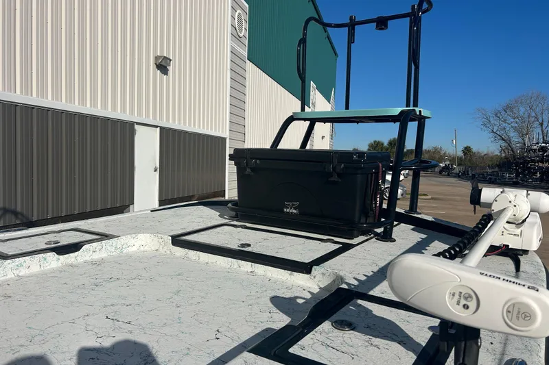 Slide: The Image of 2021 Shallow Stalker Cat 240 Pro Elite boat with elevated seat and trolling motor. - 5