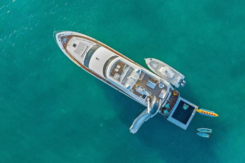 Slide: The Image of Aerial view of 2011 Princess 95 yacht with water toys in turquoise sea. - 18