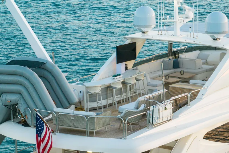 Slide: The Image of Luxurious 2011 Princess 95 yacht with spacious deck, seating, and ocean view. - 20