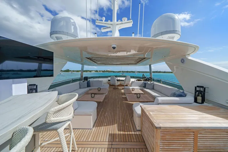 Slide: The Image of Luxurious 2011 Princess 95 yacht deck with elegant seating and ocean view. - 27