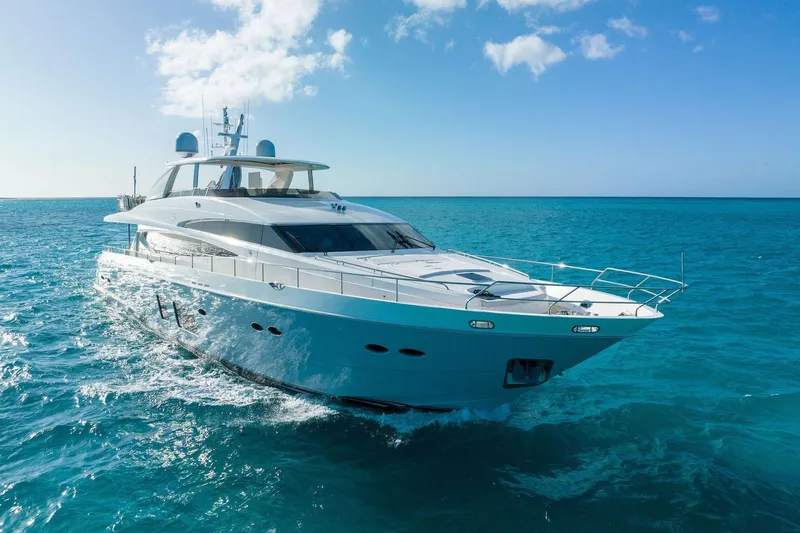 Slide: The Image of Luxurious 2011 Princess 95 yacht cruising on clear blue ocean waters. - 3