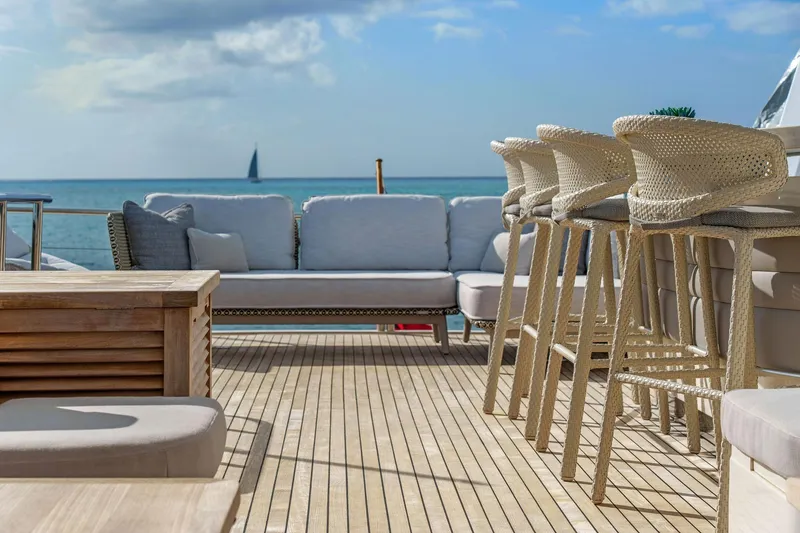 Slide: The Image of Luxurious deck of 2011 Princess 95 yacht with elegant seating and ocean view. - 30