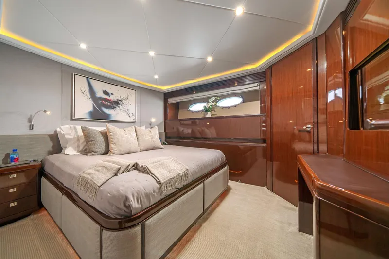 Slide: The Image of Luxurious bedroom interior of 2011 Princess 95 yacht with elegant decor and modern lighting. - 42