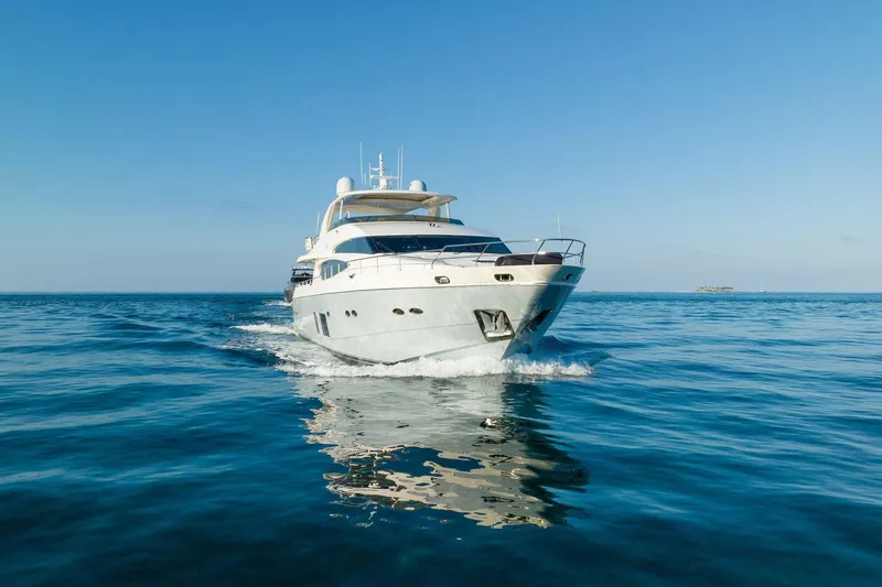 Slide: The Image of Luxurious 2011 Princess 95 yacht cruising on calm blue ocean waters. - 5