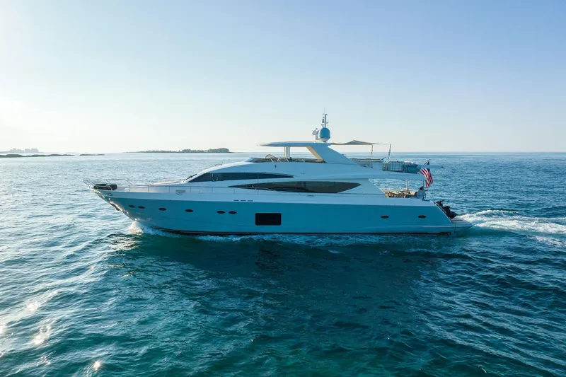 Slide: The Image of Luxurious 2011 Princess 95 yacht cruising on open sea under clear blue sky. - 7