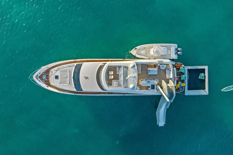 Slide: The Image of Aerial view of 2011 Princess 95 yacht with water toys in turquoise sea. - 17
