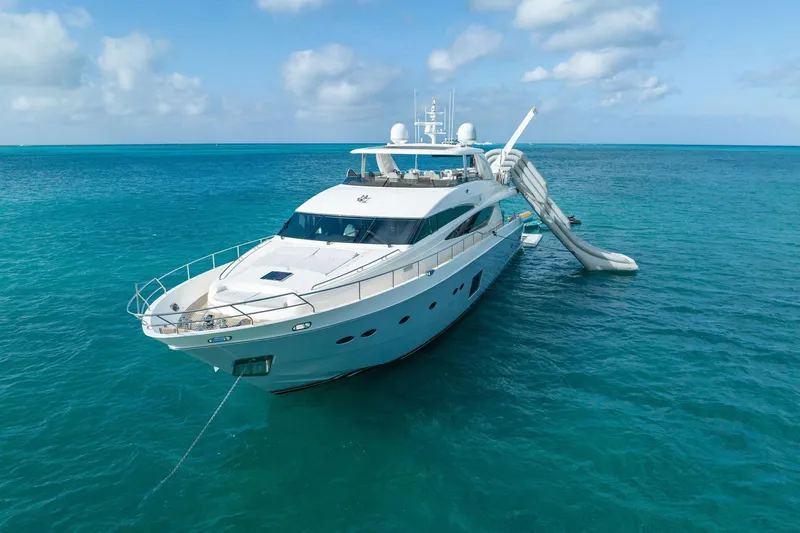 Slide: The Image of Luxurious 2011 Princess 95 yacht cruising on open sea under clear blue sky. - 6