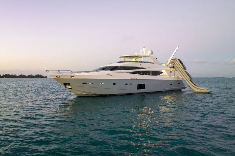 Slide: The Image of Luxurious 2011 Princess 95 yacht cruising on open blue sea under clear sky. - 9