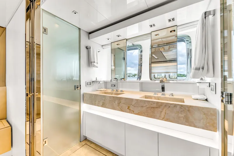 Slide: The Image of Luxurious bathroom in 2018 Sanlorenzo SL78 yacht with modern fixtures and large mirrors. - 29