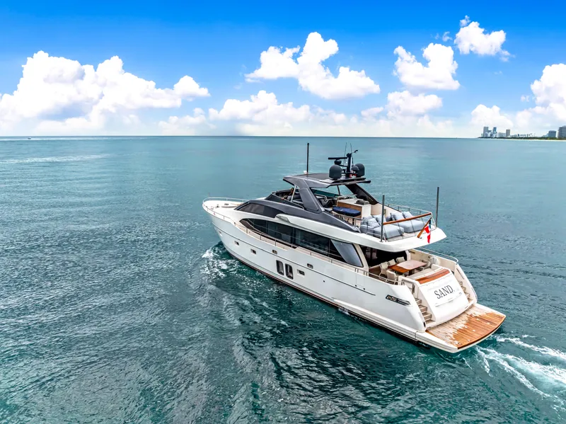 Slide: The Image of Luxurious 2018 Sanlorenzo SL78 yacht cruising on open sea under clear skies. - 6