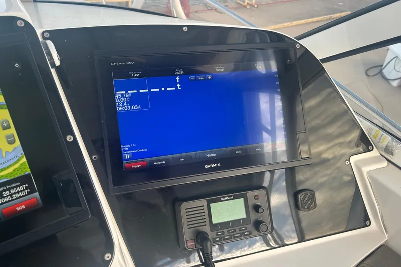 Slide: The Image of Garmin GPS display on 2007 Fountain 38 Sportfish Cruiser OB boat dashboard. - 26