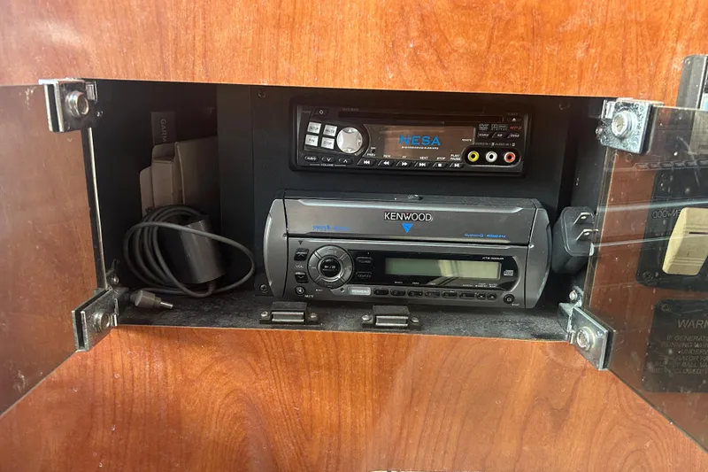 Slide: The Image of Audio system in a 2007 Fountain 38 Sportfish Cruiser OB boat cabinet. - 39