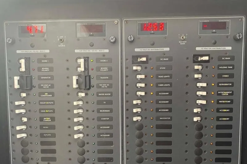 Slide: The Image of Electrical control panel of a 2007 Fountain 38 Sportfish Cruiser OB boat. - 42