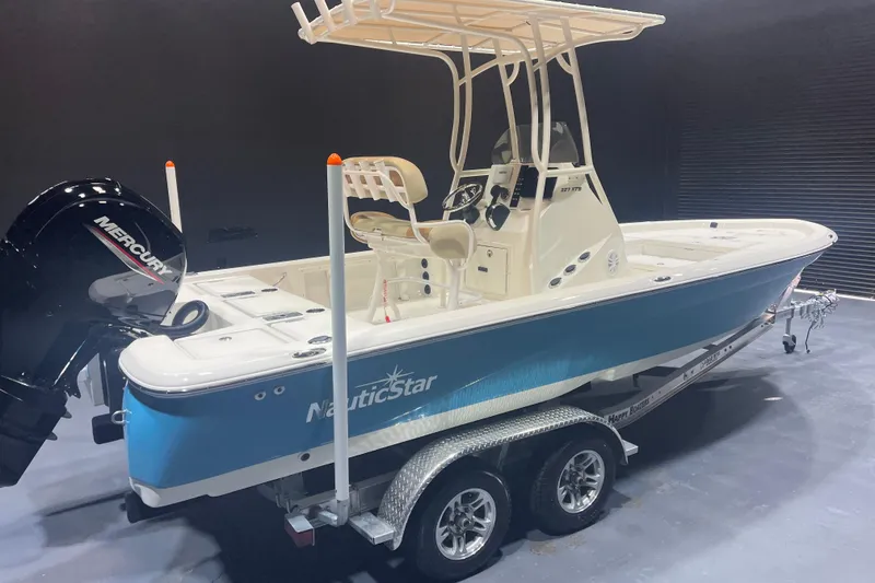 Slide: The Image of 2023 NauticStar 227 XTS boat with Mercury engine on trailer. - 4